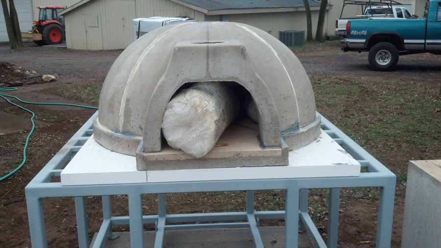 The "igloo," insulation board, and the blanket inside are part of this kit from Wildwood Ovens